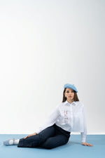 Camicia over corta con ricamo