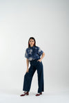 Blusa fantasia con collo polo