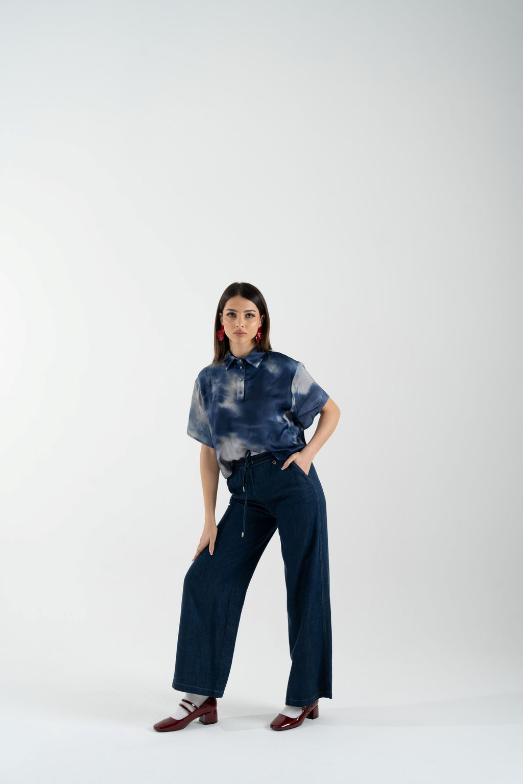 Blusa fantasia con collo polo