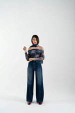Maglia in rete fantasia con scollo bardot