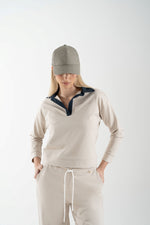 Polo in punto maglia con inserti in jeans