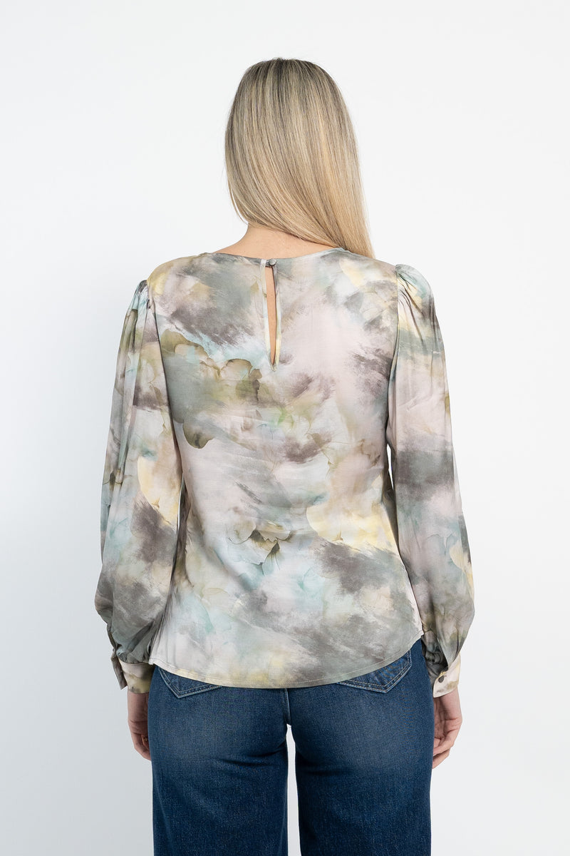Blusa fantasia scollo tondo e maniche a sbuffo