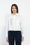 Camicia over corta con ricamo