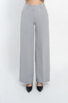 Pantalone palazzo con tasca america