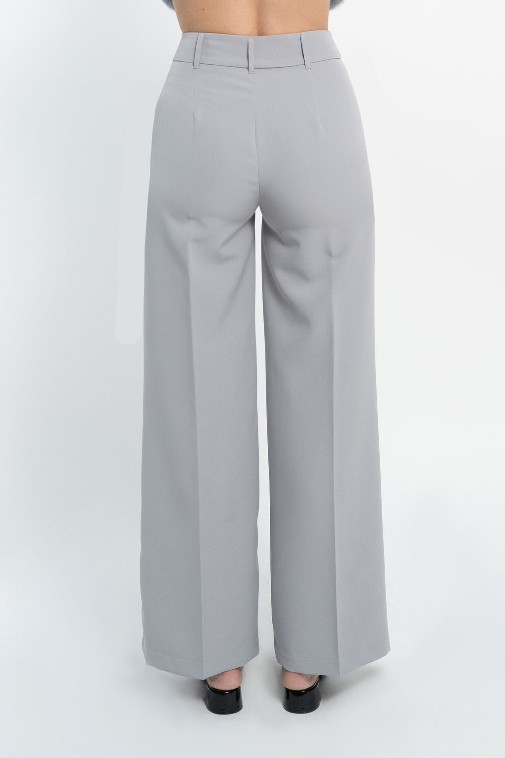 Pantalone palazzo con tasca america