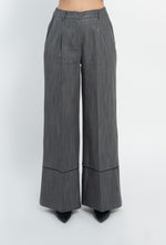 Pantalone in denim effetto laminato