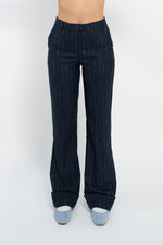 Pantalone linea dritta gessato con risvolto