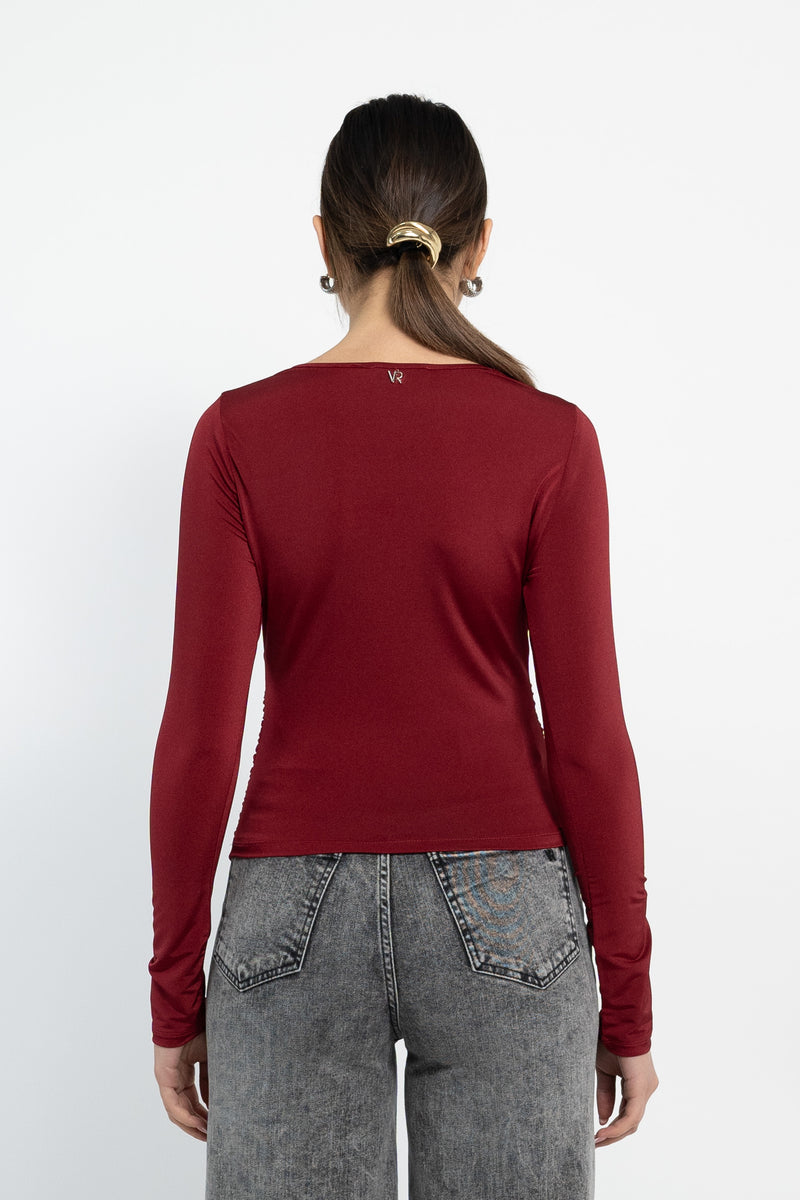 Maglia con scollo ad anello in jersey lucido