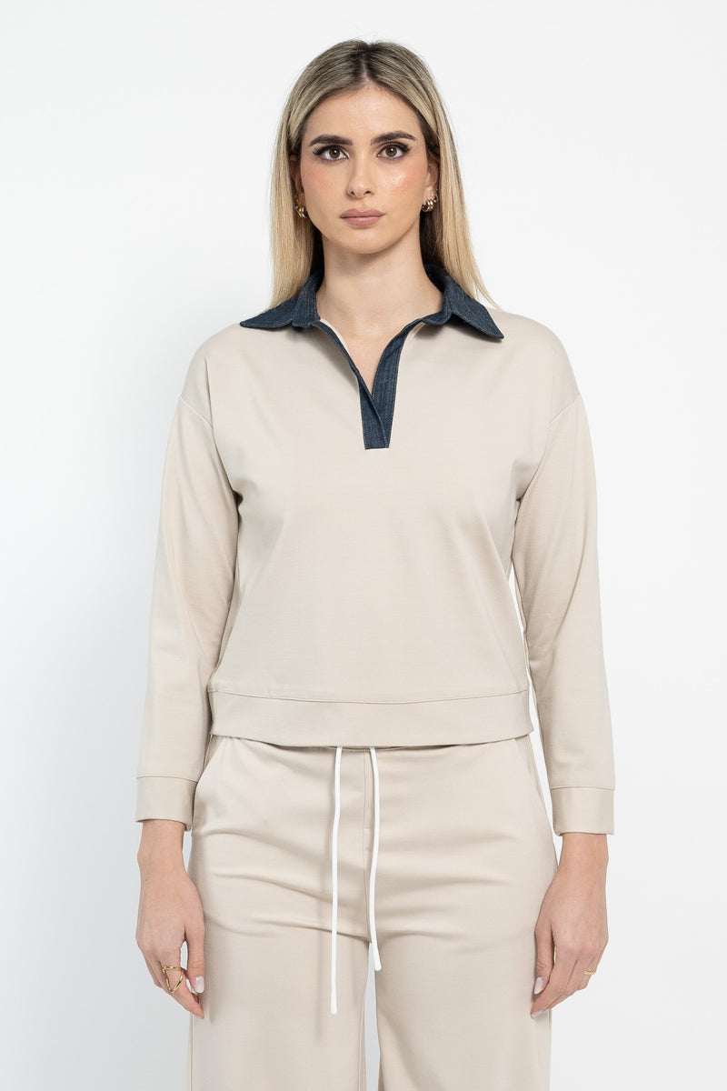 Polo in punto maglia con inserti in jeans