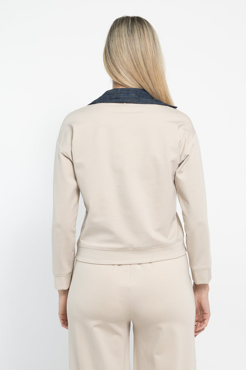 Polo in punto maglia con inserti in jeans