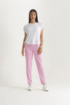 Pantalone con tasca america ed elastico dietro