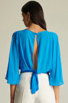 CAMICIA CON FIOCCO DIETRO E CINTA DI PAILETTES DAVANTI