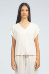 Blusa scollo a V con giro sceso