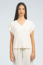 Blusa scollo a V con giro sceso