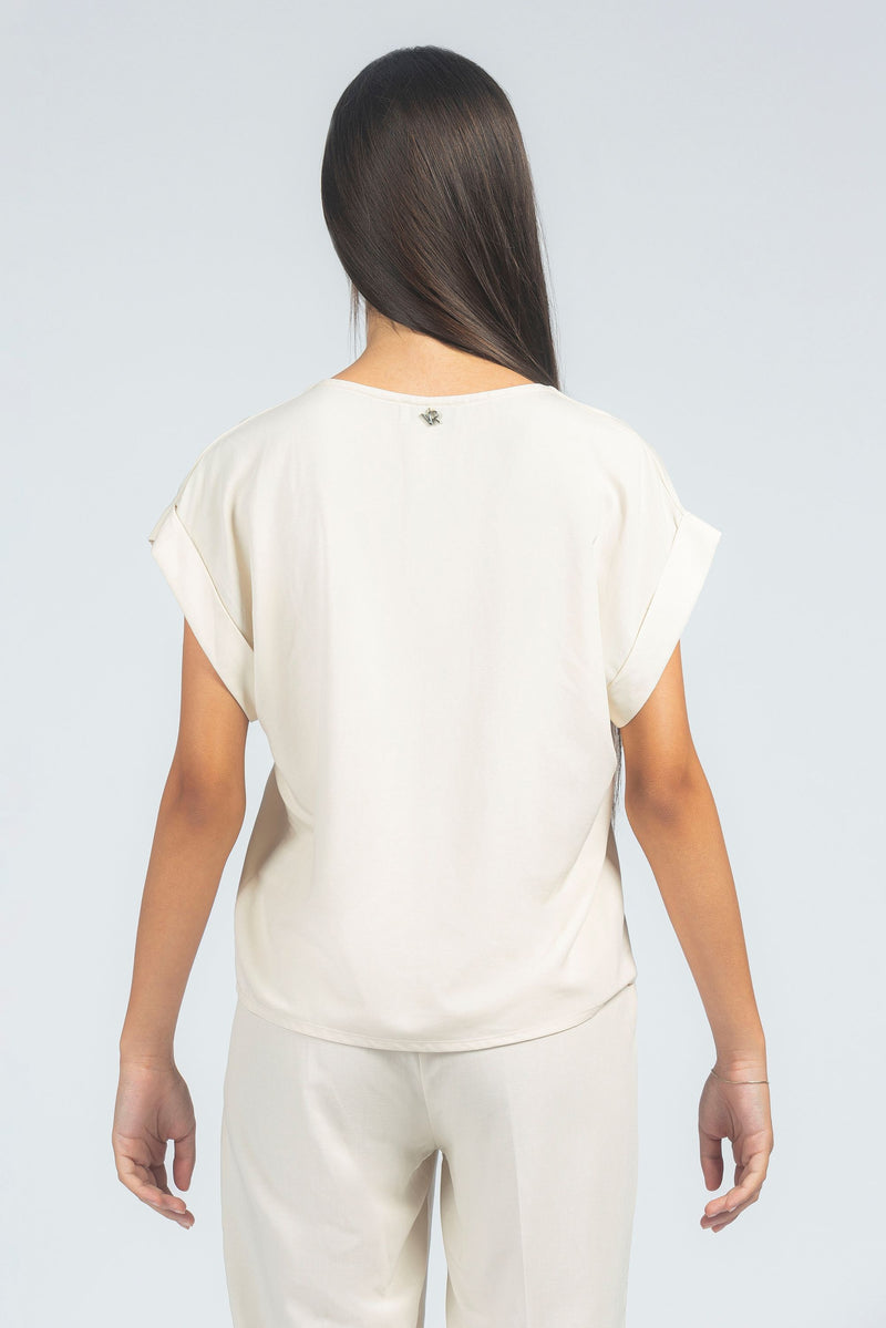 Blusa scollo a V con giro sceso